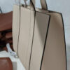 Richesse' Tan Purse Side View